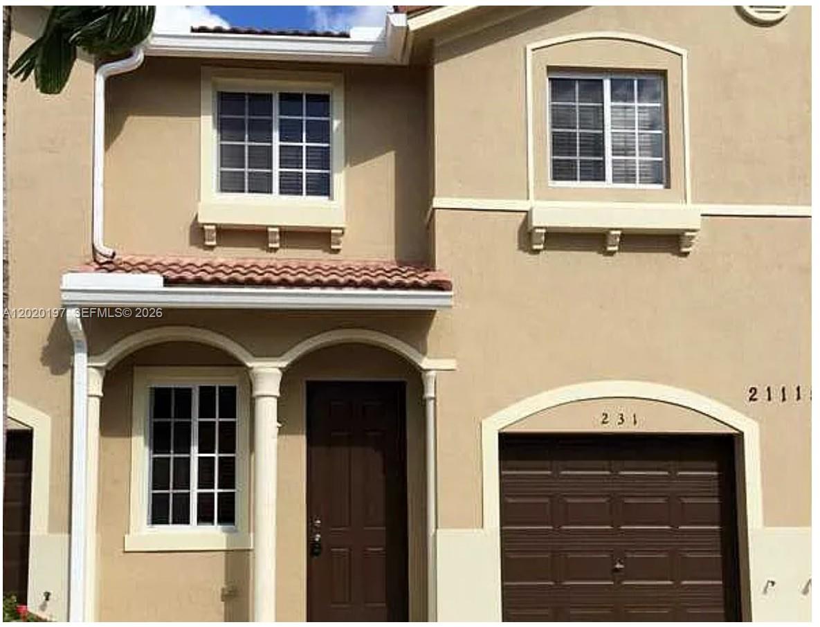 21115 NW 14th Place