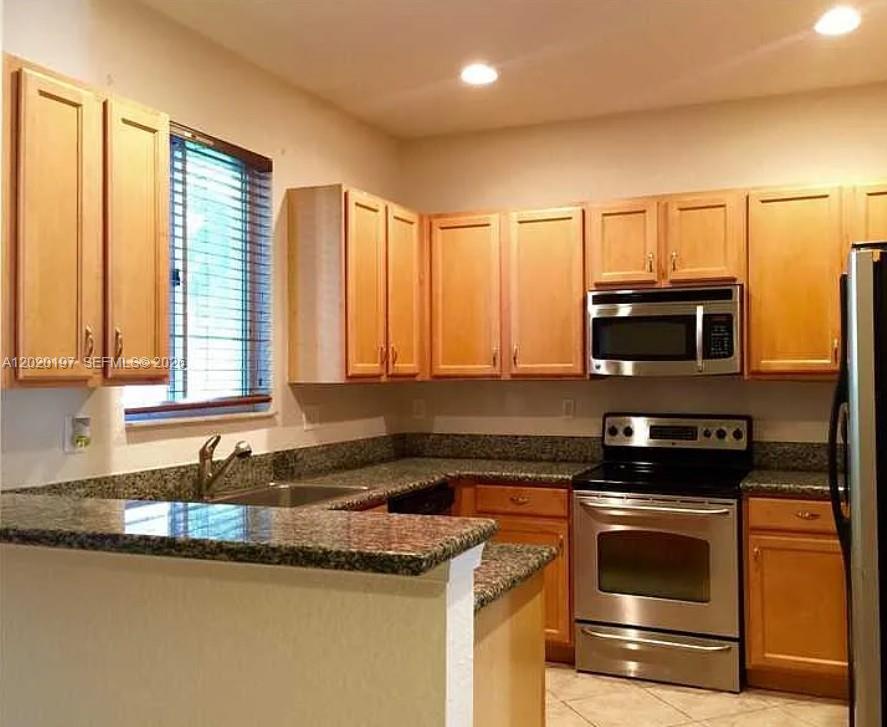 21115 NW 14th Place