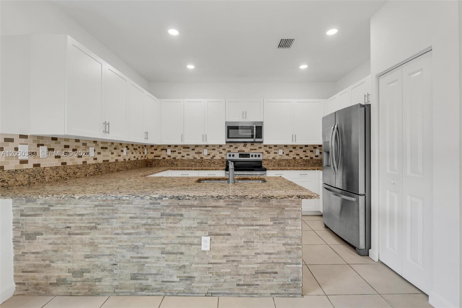 582 NE 207th Street