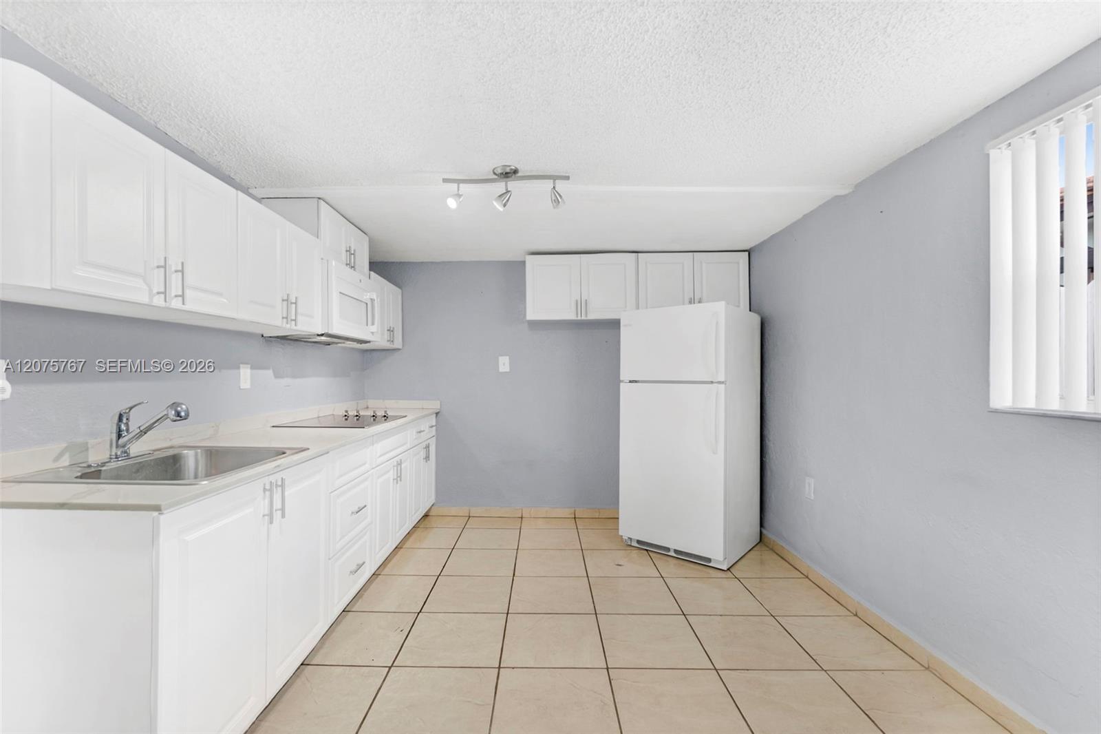 6049 W 14th Court