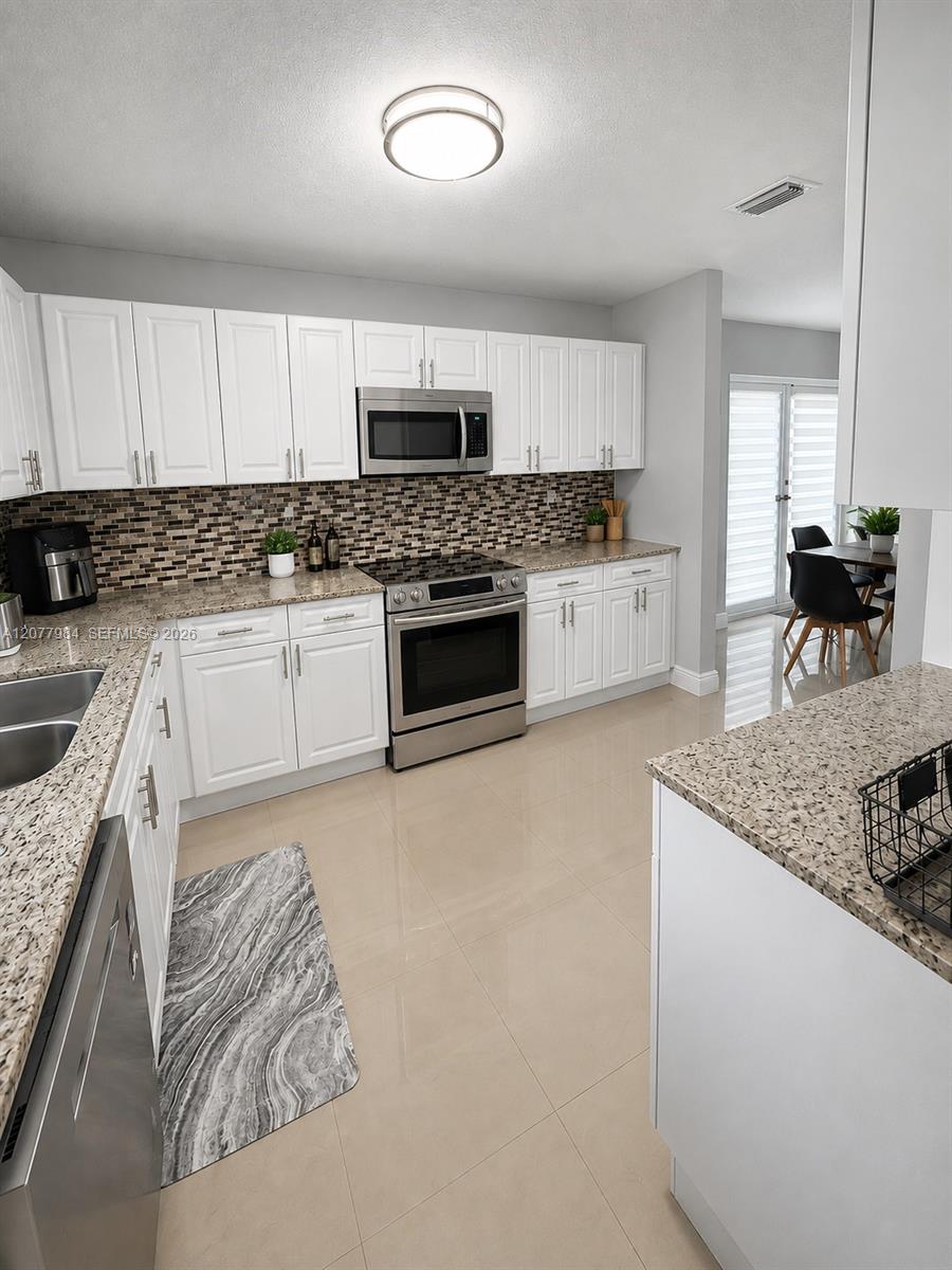 525 NW 23rd Avenue