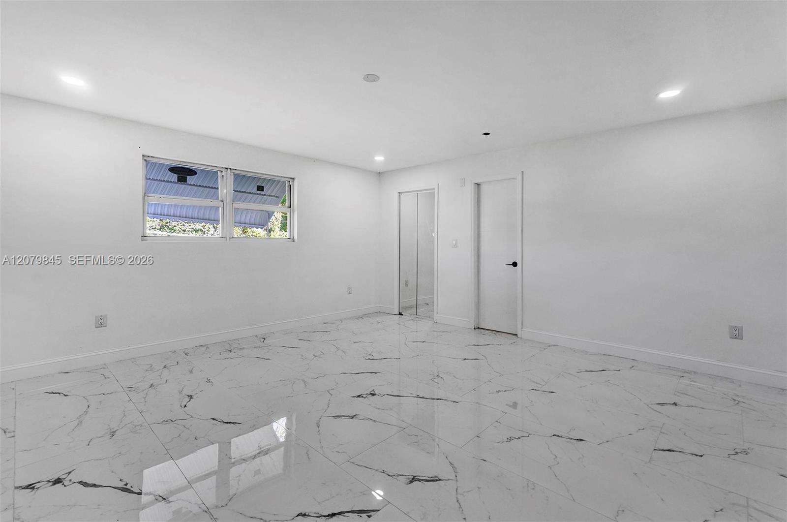 860 NW 207th Street