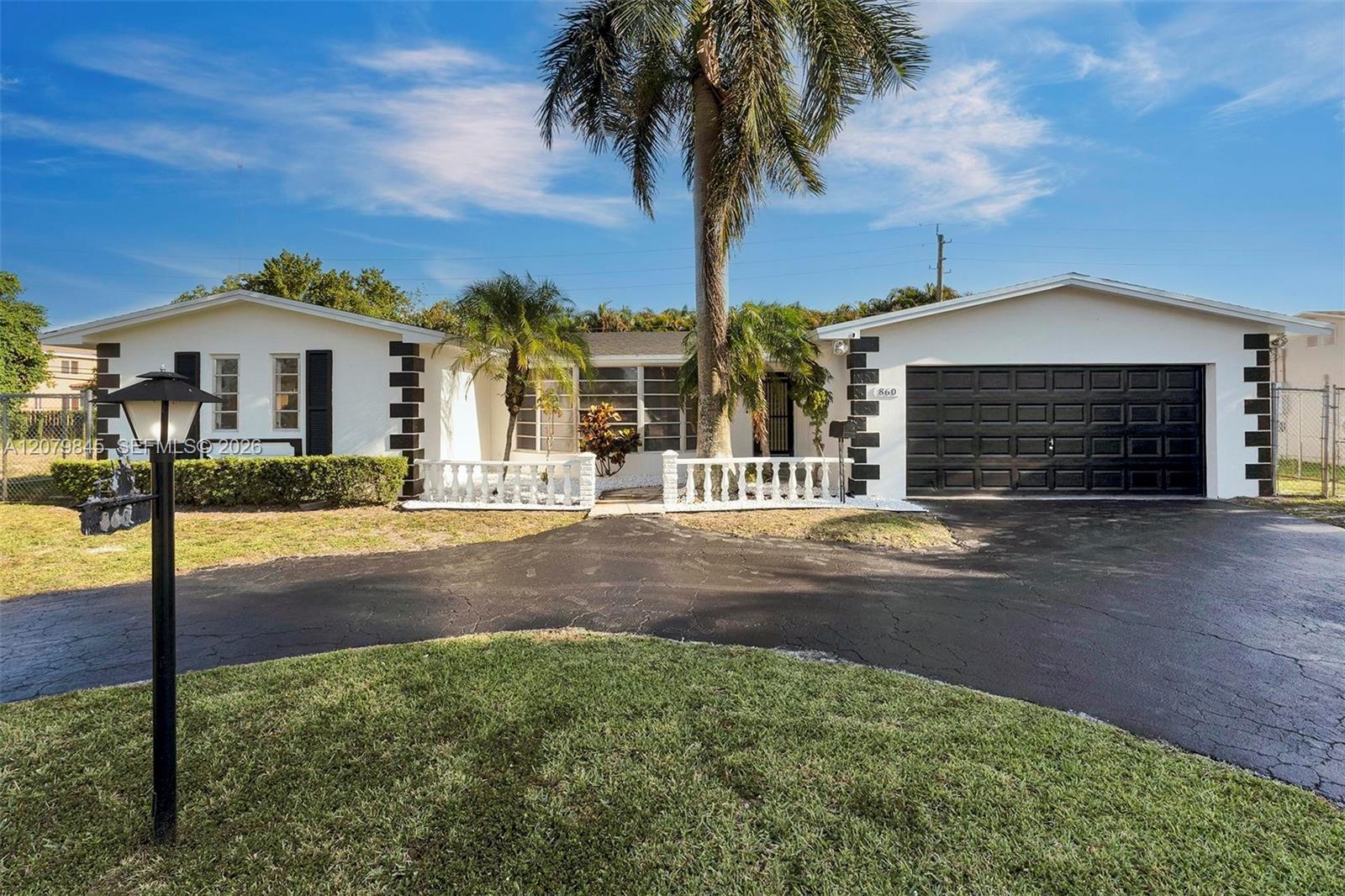 860 NW 207th Street