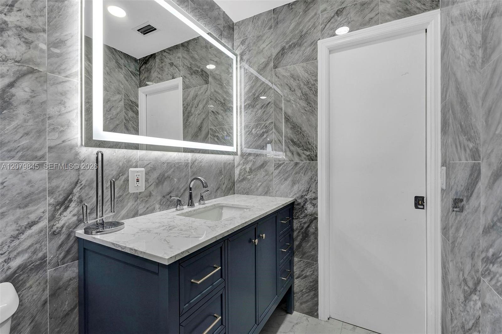 860 NW 207th Street