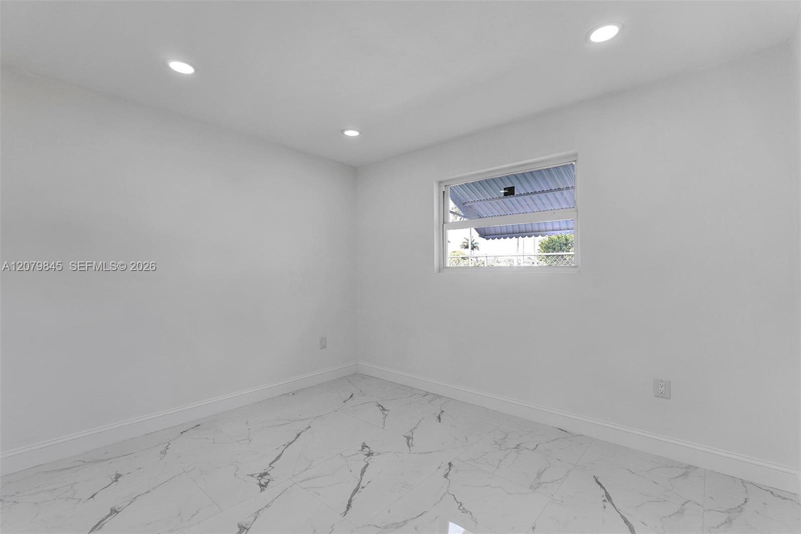 860 NW 207th Street