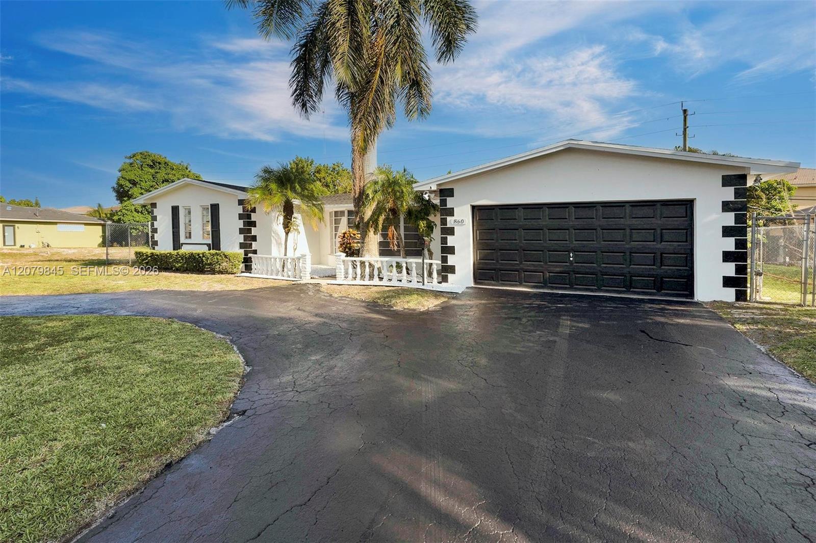 860 NW 207th Street