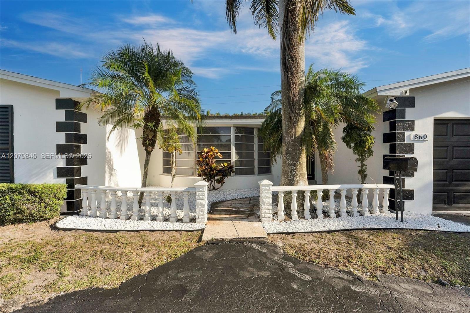 860 NW 207th Street