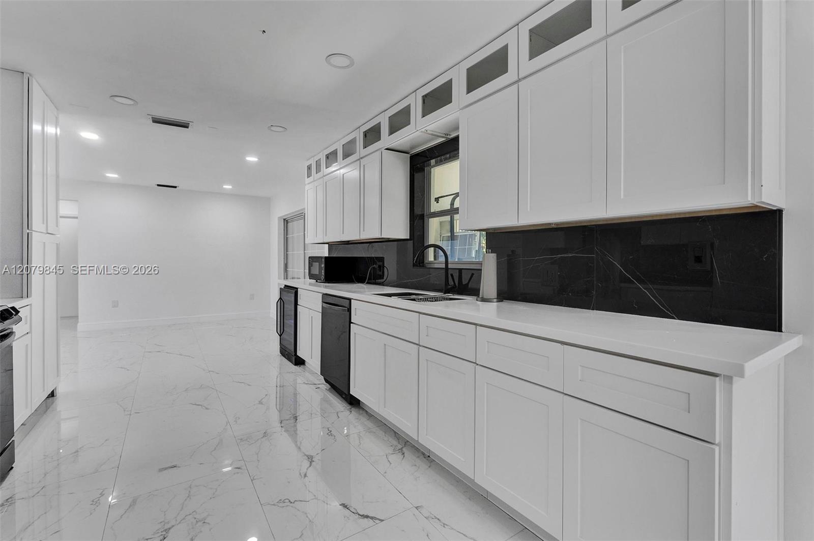 860 NW 207th Street