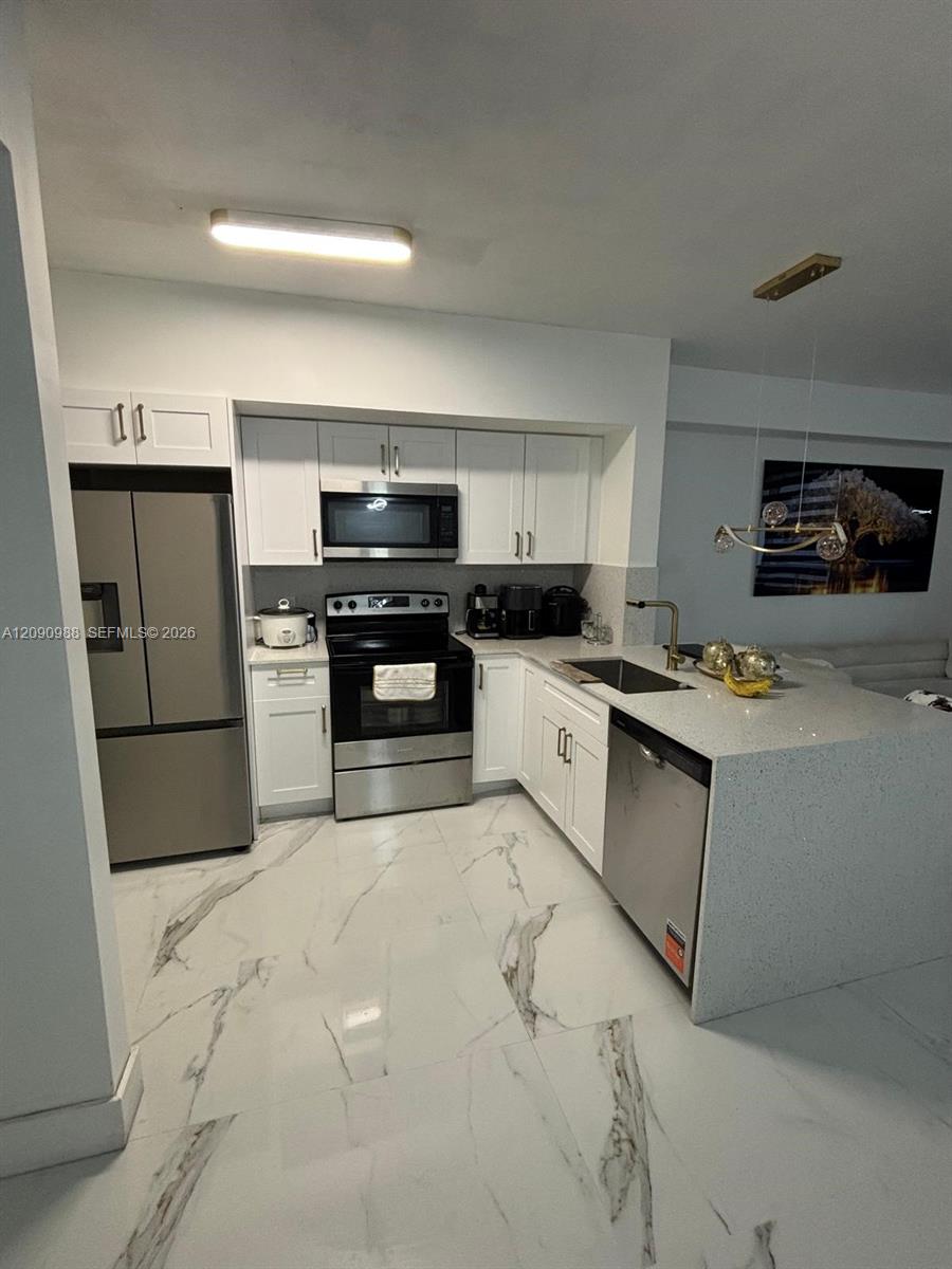 5077 NW 7th Street