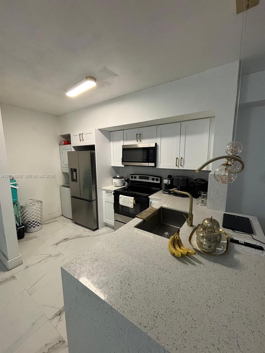 5077 NW 7th Street